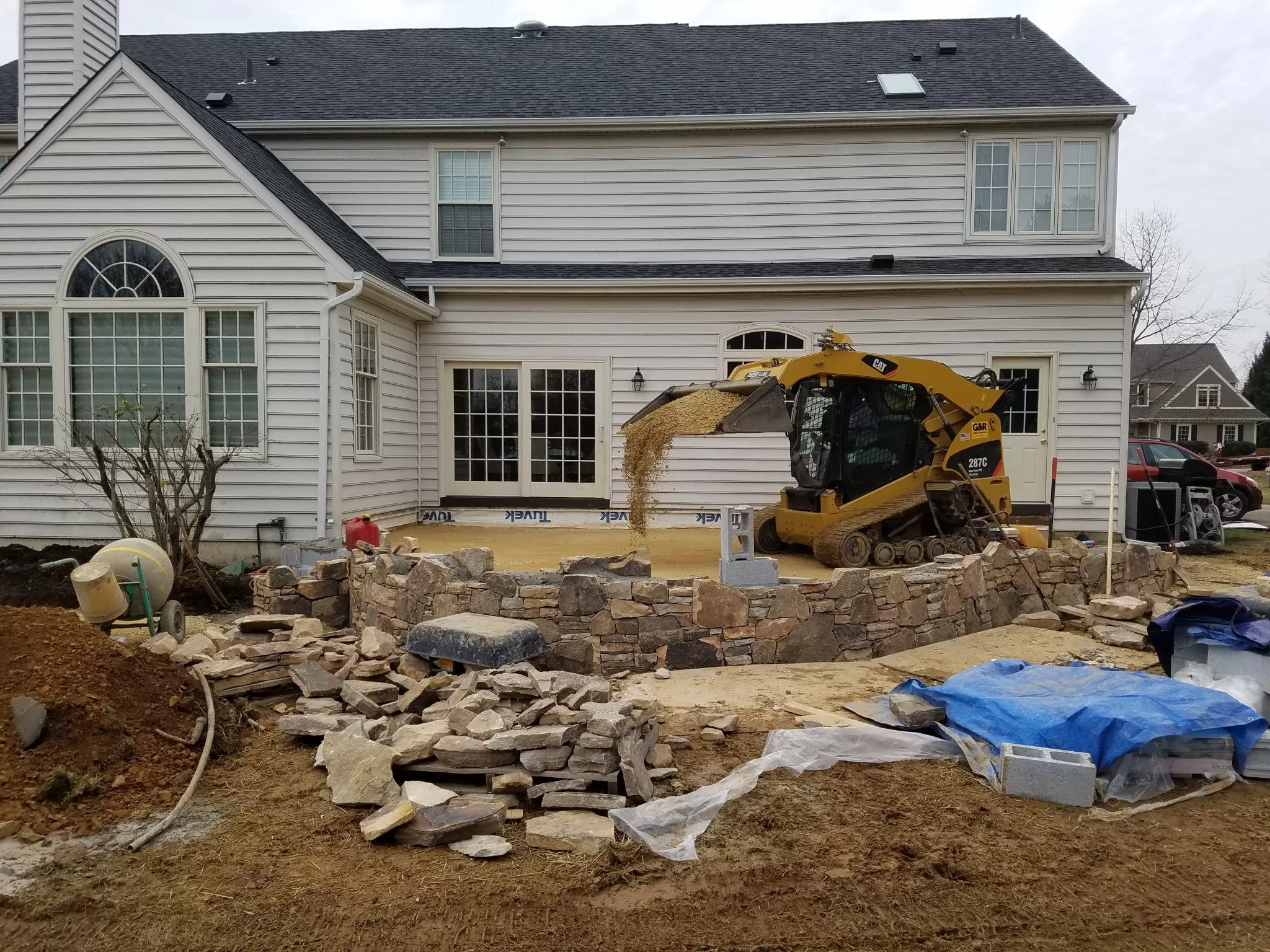 pavers patio and sitting wall in progress