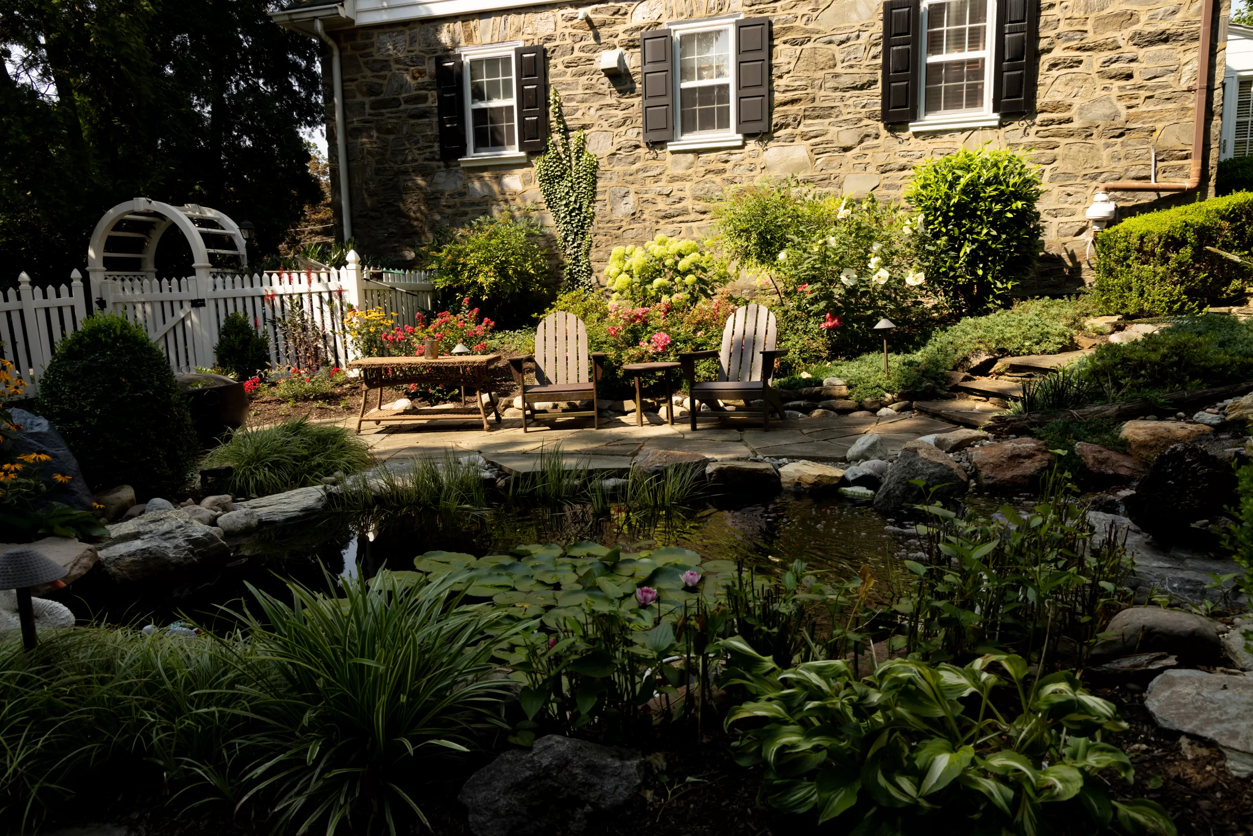 water garden with patio and flower